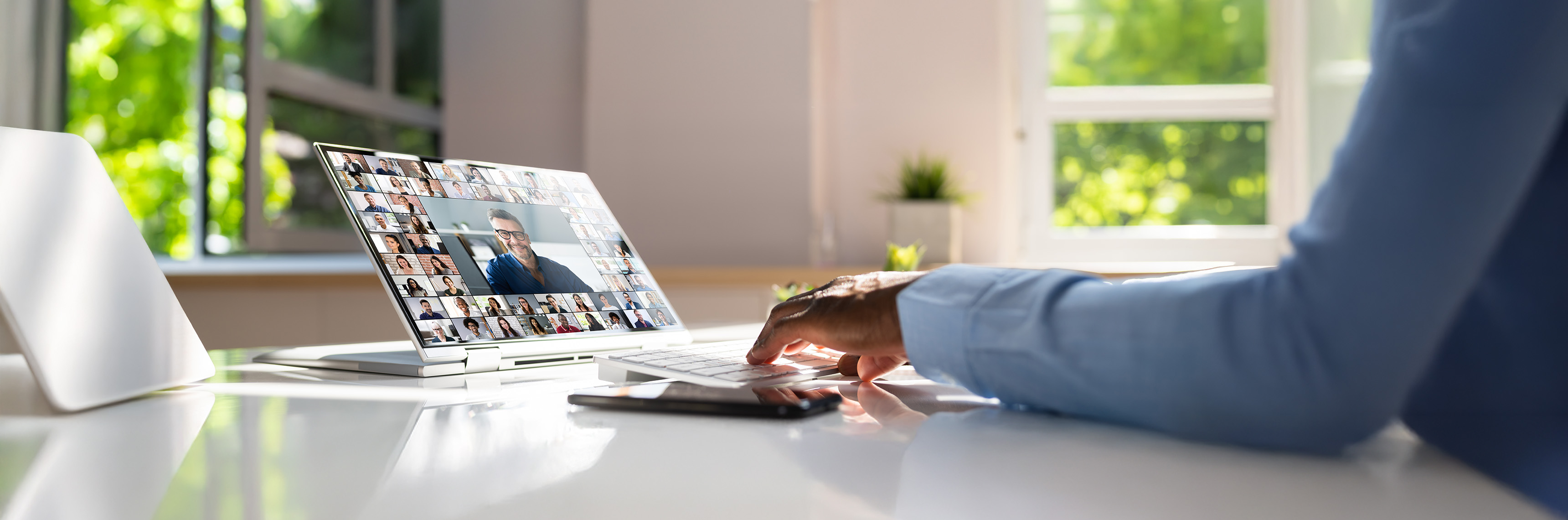 person using a laptop in a video call