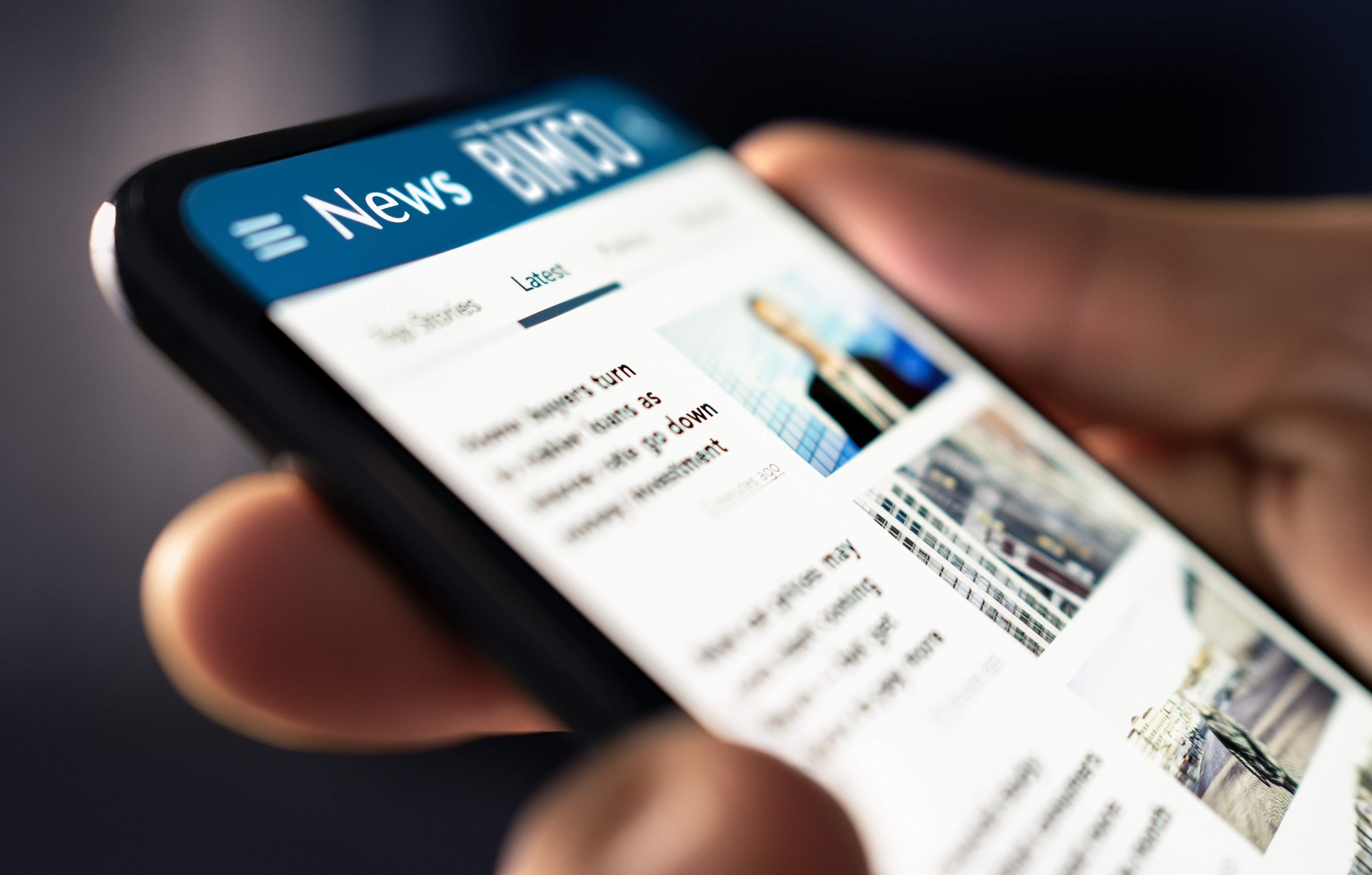 A smartphone showing news 